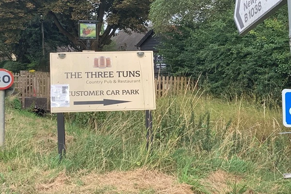 Three Tuns sign outside pub